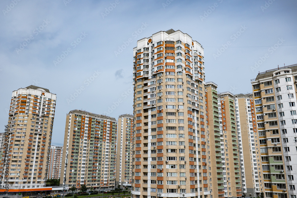 Fototapeta premium Modern high-rise apartment buildings forming part of a dense cityscape
