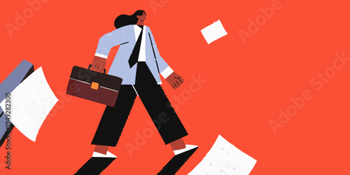 Businesswoman walking with a briefcase as papers float around her