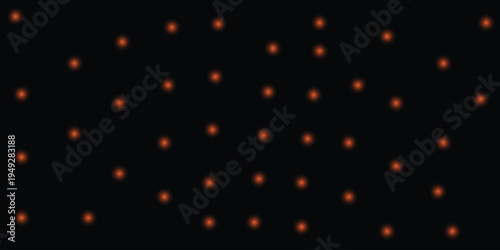 Blurry image of multicolored lights on a dark background
