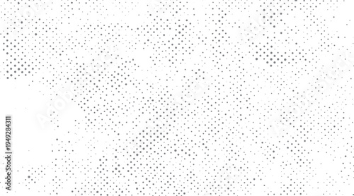 Grey dots scattered across a white background. varying sizes and densities of circles create a textured pattern