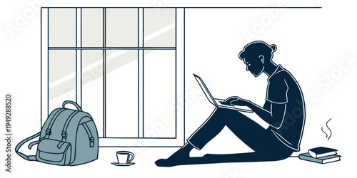 Woman sitting on the floor by a window working on a laptop with a bag nearby.