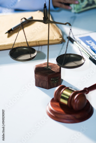 Consultation and conference of professional businesswoman and Male lawyers working and discussion having at law firm in office. Concepts of law, Judge gavel with scales of justice