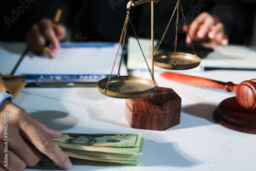 Consultation and conference of professional businesswoman and Male lawyers working and discussion having at law firm in office. Concepts of law, Judge gavel with scales of justice