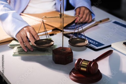 Consultation and conference of professional businesswoman and Male lawyers working and discussion having at law firm in office. Concepts of law, Judge gavel with scales of justice
