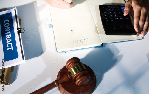 Consultation and conference of professional businesswoman and Male lawyers working and discussion having at law firm in office. Concepts of law, Judge gavel with scales of justice