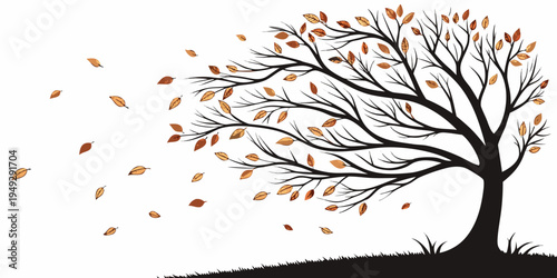 A tree shedding its leaves in a gentle breeze on a clear day