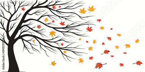 A solitary tree releasing vibrant autumn leaves into the air