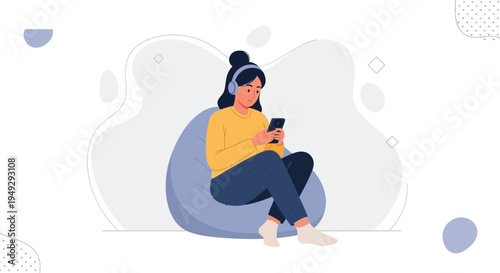 Young Woman Listening to Music on Phone with Headphones, Relaxing on Beanbag Chair