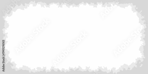 A roughly rectangular white space framed by a jagged gray border