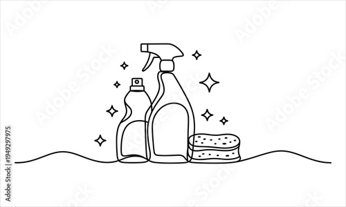 Essential household cleaning supplies including spray bottles and a sponge are ready for tidying tasks