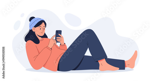 Young Woman Relaxing Indoors Using Smartphone, Cozy Winter Outfit