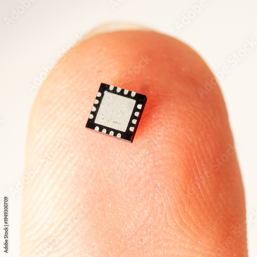 Photography Bottom/pad side facing up, white background
Macro close-up of a QFN integrated c