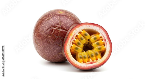 Passion fruit cut open showing yellow pulp and seeds