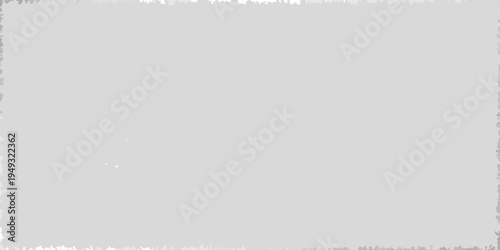 A mostly gray image with a small bright white spot