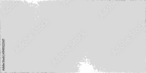 A predominantly gray image with subtle white speckles and blurred texture