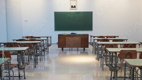 Empty classroom with chalkboard and rows of desks with chairs. break at school. 4k videos. classroom at school.