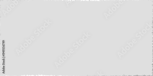 A grayscale image of blurred text on a light gray background