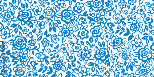 A seamless repeating pattern of hand drawn blue floral designs