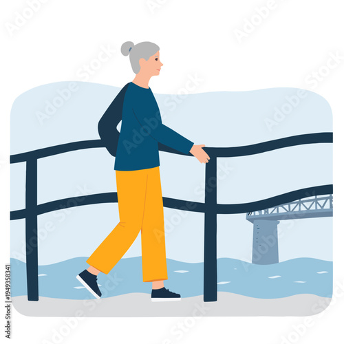 Elderly woman walking beside railing near water in outdoor setting. Elderly set