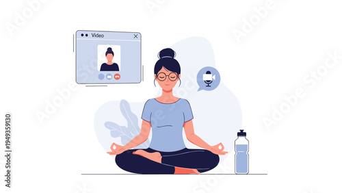 Young woman practicing yoga and meditation at home while following an online video tutorial on her computer.
