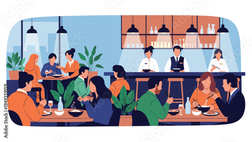 Large group of people dining and talking together inside a busy modern restaurant with waiters and a kitchen bar.