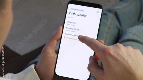 Person Checking Medical History and Orthopedist Report on Smartphone. a user navigating a sleek health log app. Scrolling through records and opening an orthopedic report showing back strain diagnosis