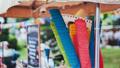 Fotografía Stacks of vibrant ice cream cones ready for serving at a street food stall