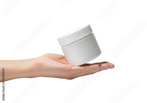 A person holding a small white cosmetic jar in their open palm for skincare and beauty branding
