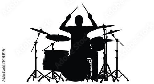 Silhouette vector illustration of a dynamic musician powerfully playing a full drum kit with energy