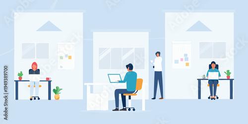 Modern office space with diverse employees working at desks and collaborating