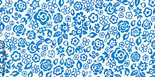 A repeating pattern of blue floral designs on a white background