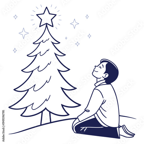 Boy admires glowing Christmas tree star.