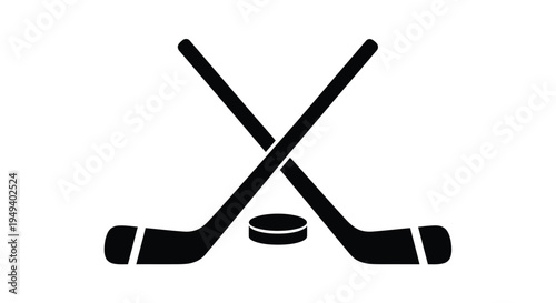 Two hockey sticks and a puck in a dark silhouette