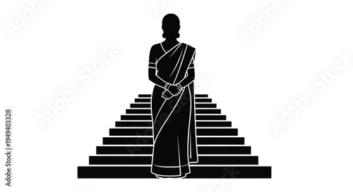 Woman in traditional sari standing on steps a striking silhouette