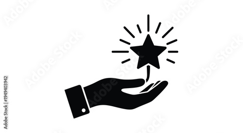 A hand presenting a shining star a dramatic silhouette