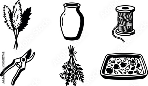 Black and white line art vase dried flowers pruning shears thread spool and flower petals on tray collection