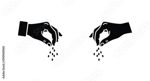 Two hands gently pouring or sprinkling small particles downwards