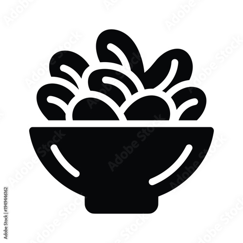 Simple black icon of a bowl filled with stylized leaves or petals, symbolizing nature, food, or organic elements.