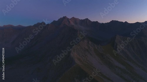 Flying over the beautiful mountain ranges at dusk