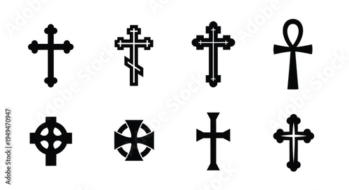 Collection of various black christian crosses and an ankh symbol on a white background