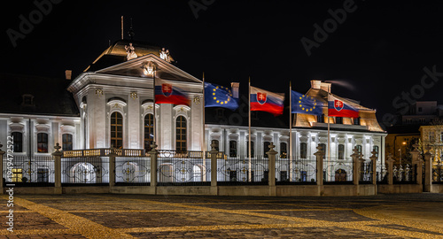 Canvas Print Presidential Palace Bratislava at night with illuminated facade reflection