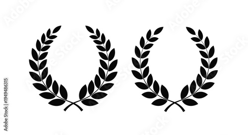 Two black laurel wreaths displayed side by side on a white background