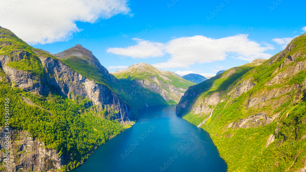 Obraz premium Seven Sisters Waterfall, Geiranger Fjord, Norway. Nature in fjords. Traveling through the Norwegian fjords. Scandinavia. View of nature from the drone. Vacation and travel in summer Norway