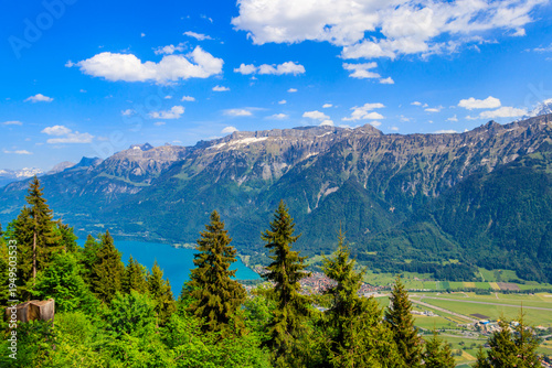 Obraz na plátně Breathtaking aerial view of Interlaken, Lake Brienz and Swiss Alps from Harder K
