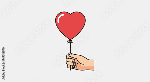 Hand holding a red heartshaped balloon symbolizing love and affection.