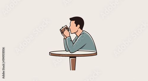 Man enjoying a warm beverage at a table.