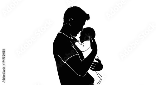 Father Holding Baby in Silhouette.