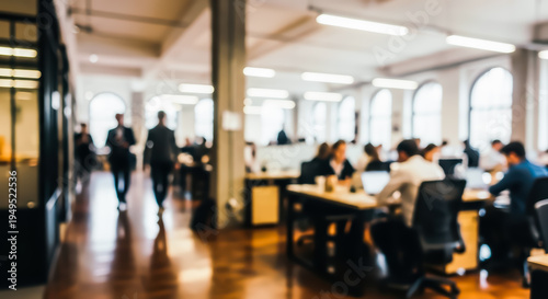 Wallpaper Mural Blurred view of a busy modern office interior with employees working at desks and walking in hallway Torontodigital.ca