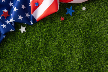 American flag draped over green grass with glitter stars and patriotic colors, ideal for Fourth of July, Memorial Day, Veteran Day and Labor Day celebrations