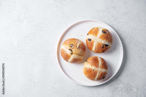 Cross buns with raisins for Easter holidays